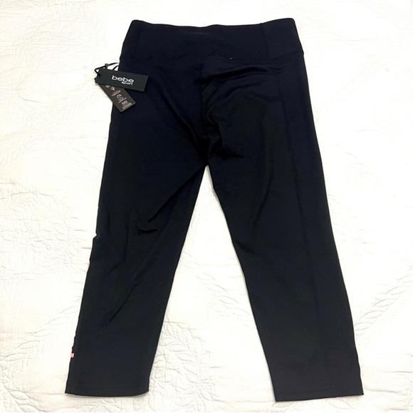NWT BEBE SPORT LASER CUT LOGO BLACK CAPRI LEGGINGS - Picture 5 of 10